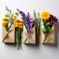 Bunches of Flowers Herbs and Dried Flowers in Kraft Packaging on White Background