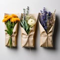 Bunches of Flowers Herbs and Dried Flowers in Kraft Packaging on White Background