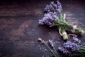 Bunches of fresh aromatic lavender on rustic wood Royalty Free Stock Photo