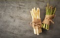 Bunches of fresh asparagus tips tied with string Royalty Free Stock Photo