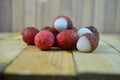 Close up bunches of Lychees fruit on wooden table background