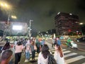 Evening atmosphere with heavy vehicle traffic and people going Royalty Free Stock Photo