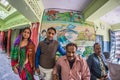 Bundi, India - February 11, 2017: Four people looking at camera inside of local school in Bundi, Rajasthan, India. Fish eye distor