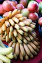 Bundle of Bananas and Apples on Sale Display at Farmers Market Royalty Free Stock Photo