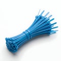 Bundle of blue cable ties on white background Royalty Free Stock Photo