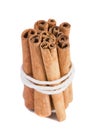 Bundle of cinnamon sticks on the white background. Royalty Free Stock Photo