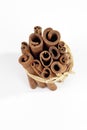 Bundle of cinnamon sticks on white background Royalty Free Stock Photo