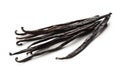 Bundle of dried bourbon vanilla beans or pods over white