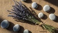 Lavender are smooth round gray stones creating a natural rustic Royalty Free Stock Photo