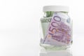 Bundle of European Currency Banknotes Put in Jar Royalty Free Stock Photo