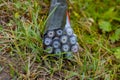 Bundle of fiber optic cables for fast internet laying in the grass at a construction site Royalty Free Stock Photo