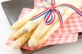 Bundle of fresh Dutch asparagus on napkin