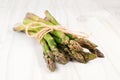 Fresh green asparagus on a white wooden table Royalty Free Stock Photo