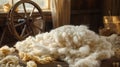 bundle of freshly sheared wool, soft and fluffy, resting on a rustic wooden table Royalty Free Stock Photo
