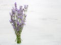 Bundle of lavender on old wooden board painted white