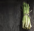 Bundle of Lemon Grass on wood background. Royalty Free Stock Photo