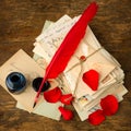 Bundle of letters and red rose petals Royalty Free Stock Photo