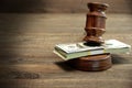 Bundle Of Money, Judges Gavel And Soundboard On Wooden Table Royalty Free Stock Photo