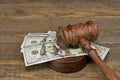 Bundle Of Money, Judges Gavel And Soundboard On Wooden Table Royalty Free Stock Photo