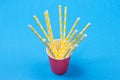 A bundle of multi-colored drinking straws in a paper Cup Royalty Free Stock Photo