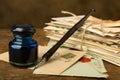 Bundle of old letters and ink well Royalty Free Stock Photo