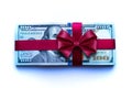 A bundle of one hundred dollar bills tied with a red ribbon Royalty Free Stock Photo
