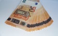 A bundle of real 50 euro banknotes on a white table Royalty Free Stock Photo
