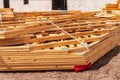 Bundle of roof trusses, for single house, on ground