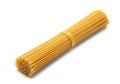 Bundle of uncooked spaghetti pasta isolated on white background Royalty Free Stock Photo