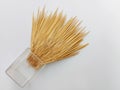 Bundle of Wooden Toothpicks coming out from jar isolated Royalty Free Stock Photo