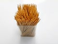 Bundle of Wooden Toothpicks coming out from jar isolated Royalty Free Stock Photo