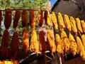 Bundles of orange wool hanging to dry at dyers souk, Marrakech, Morocco.