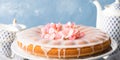 Bundt cake with frosting. Festive treat spring flowers banner