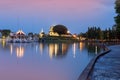 Bung Phalanchai Lake, public park and landmark of Roi Et province, northeastern Thailand, with duck pedal boats during sunset Royalty Free Stock Photo