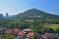 Bungalow residential area, golf course field, tall buildings and hill of Bukit Jambul, Pulau Penang Island, Malaysia