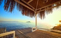 Bungalow on the sea at sunset. Wooden pavilions on the shore of a sandy beach - Bodrum, Turkey Royalty Free Stock Photo