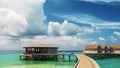 Bungalow on stilts in the water, amazing tropical nature. Maldives resort Royalty Free Stock Photo