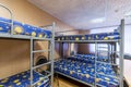 Bunk metal beds in hostel room Royalty Free Stock Photo