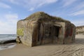 Bunker at Furreby beach at the water's edge Royalty Free Stock Photo
