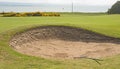 Bunker on golf course by the sea. Royalty Free Stock Photo