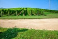 Bunker at a golf course at Zlati Gric with a vineyard in the background at Slovenia