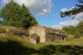 Bunker ruin with graffiti in the forest at Karosta old military base, Liepaja