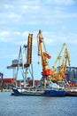 Bunker ship (fuel replenishment tanker) under port crane Royalty Free Stock Photo