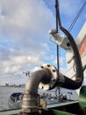 Bunkering tanker container ship in port close up Royalty Free Stock Photo