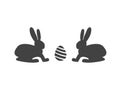 Bunnies with an egg. Abstract flat icon design. Happy Easter! Royalty Free Stock Photo