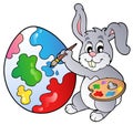 Bunny artist painting Easter egg Royalty Free Stock Photo
