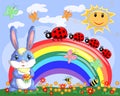Bunny with a bouquet in a meadow near the rainbow. Spring, love