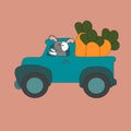 The rabbit is carrying carrots in a car