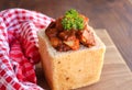 Bunny chow. Traditional South African cuisine. Loaf of hollowed out bread filled with curry