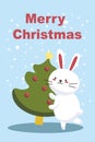 Bunny decorating christmas tree isolated. Merry Christmas and Happy New Year. Winter character with decorations. Cute Royalty Free Stock Photo